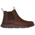 A brown leather boot with elastic side panels and a rubber sole stands upright showcasing its sleek design and casual style suitable for various environments like urban or outdoor settings.