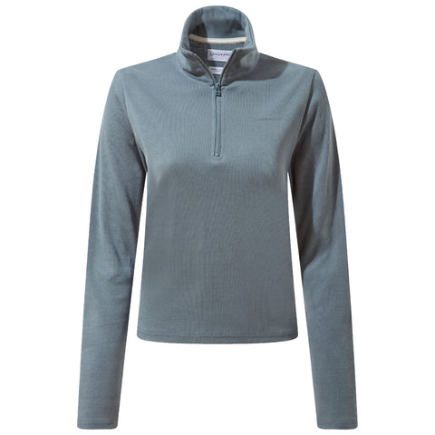 A long-sleeve quarter-zip pullover in light blue fabric rests flat against a neutral background showcasing a simple design tailored for casual or active wear.