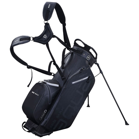 A golf carry bag stands upright with extended legs showcasing multiple compartments and a padded shoulder strap for easy transport in an outdoor setting designed for golfers.