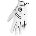 A white golf glove is displayed prominently with black accents while resting on a flat surface suggesting its intended use in golfing activities to enhance grip and control.