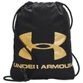 A black drawstring backpack features a large glossy gold Under Armour logo and brand name at the bottom showcasing its sporty design suitable for gym or casual use.