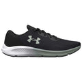 A black athletic shoe features a breathable mesh upper with a textured design and laces for secure fit showcasing the brand logo on the tongue.