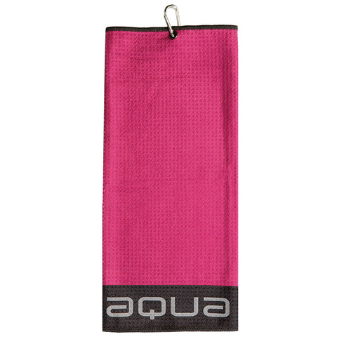 A pink towel hangs vertically displaying a textured surface equipped with a metal clip at the top and a dark band featuring the word "aqua" at the bottom