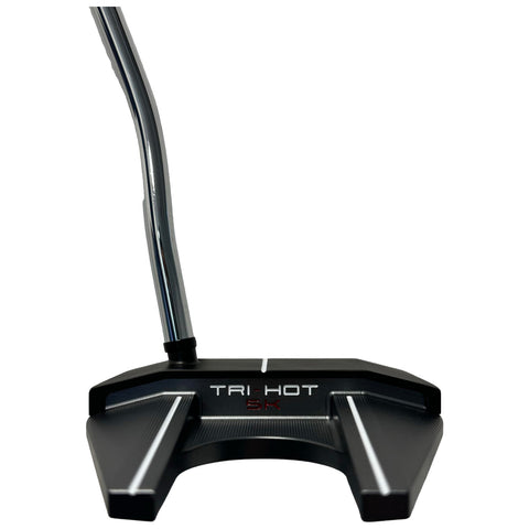 A black golf putter with a sleek design is positioned on a flat surface its curved handle pointing upwards while a logo reading TRI-HOT 5K is displayed on the head.