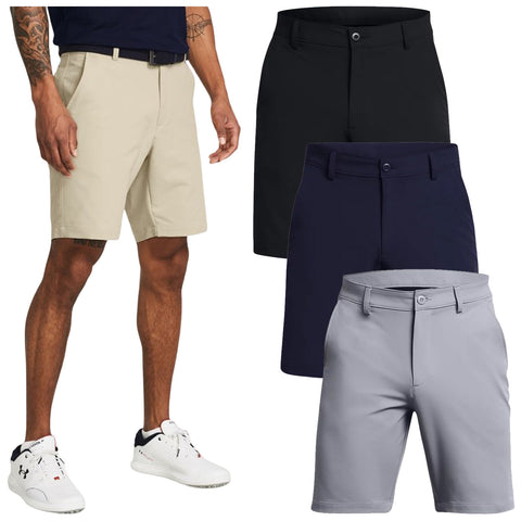 A man wears khaki shorts while standing next to three pairs of shorts in black navy and gray displayed vertically against a plain background.