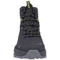 Black hiking boot with green laces stands upright displaying rugged design and textured surface suitable for outdoor activities placed on a neutral background emphasizing its features and functionality