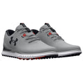 Gray athletic shoes are positioned side by side featuring a sleek design with black and red accents laces are threaded through eyelets showcasing a sporty appearance and likely intended for outdoor activities