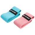 Two fabric resistance bands in blue and pink are neatly folded beside each other displaying the brand name Pure on black patches indicating they are fitness accessories for strength training or rehabilitation.