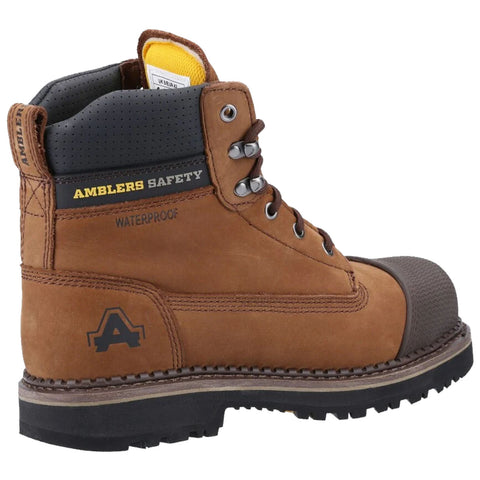 A brown leather safety boot stands upright showcasing a robust design and reinforced toe cap featuring elements like a waterproof label and branding on the side with a textured collar on top.