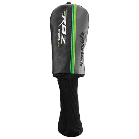 A golf club headcover is resting upright featuring a black and green design with logos from TaylorMade and RBZ SpeedLite showcasing its protective purpose while the knitted bottom offers a secure fit.