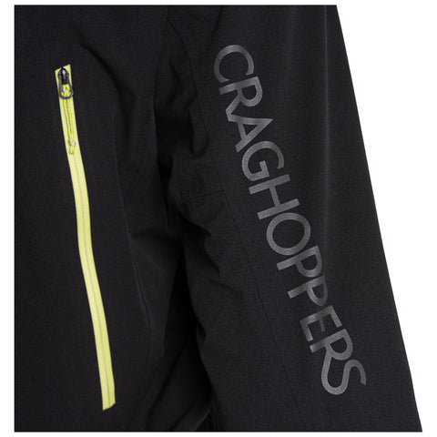 A black jacket features a prominent yellow zipper on the left arm and the word "CRAGHOPPERS" printed vertically in silver along the right sleeve.