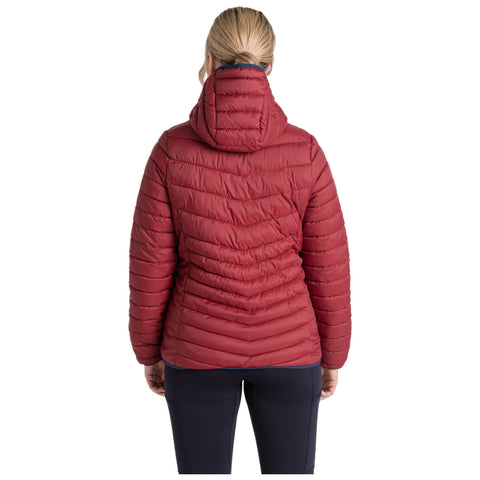 A person is wearing a red puffy jacket with a hood while standing, showcasing the back view. The surrounding context is neutral and unobtrusive.