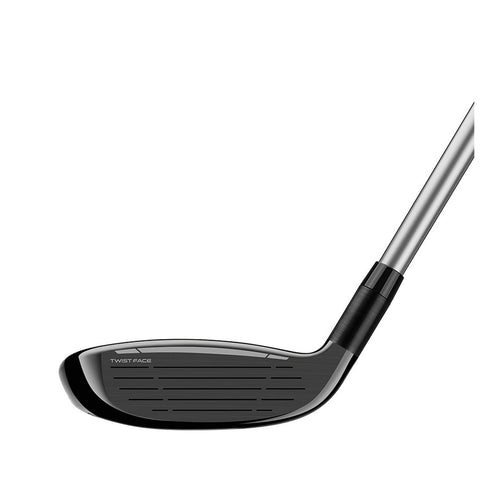 A golf club head with a sleek black face featuring grooves is positioned horizontally showing the unique twist face design intended for improved accuracy in hits against a neutral backdrop