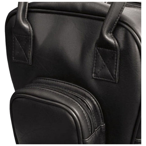 A black leather bag sits upright with two top handles and a small front pocket featuring a zipper showcasing smooth texture and minimalist design in a neutral background.