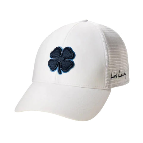 A white baseball cap features a black embroidered four-leaf clover on the front with blue accents and has the text "Live Lucky" on the side. It appears suitable for casual wear.