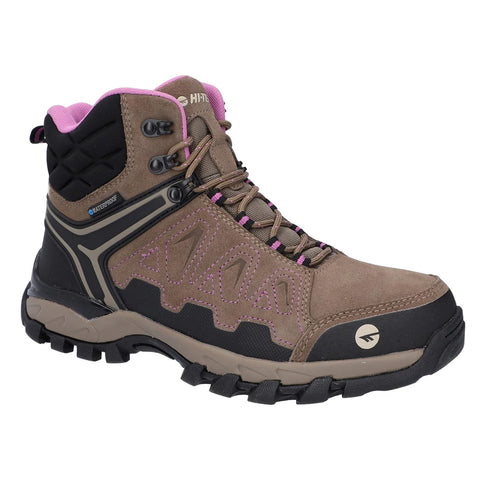 A brown hiking boot features a slightly padded black collar and pink details with a textured sole designed for traction showcasing a waterproof label on the side.