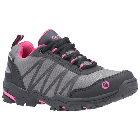 A gray and black athletic shoe with pink accents sits on a flat surface the shoe features a textured sole and laces suggesting it is designed for outdoor activities or running.