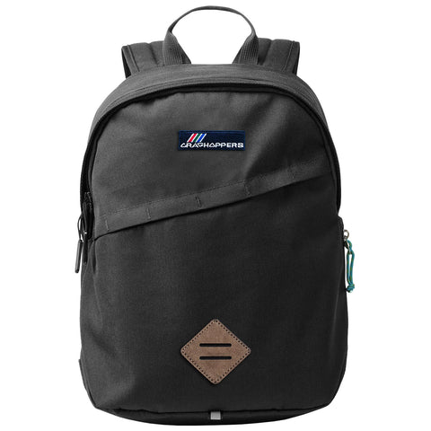 A black backpack with a logo on the front and a leather accent near the bottom is displayed against a neutral background showcasing a simple and functional design suitable for everyday use.