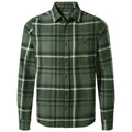 A green plaid flannel shirt is displayed hanging vertically showing its buttoned front and long sleeves with one breast pocket visible against a plain white background.