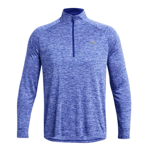 A blue long-sleeve pullover features a half zip collar and a textured pattern made of performance fabric designed for athletic activities and outdoor wear.