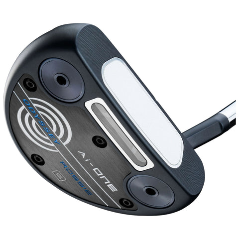 A golf putter with a black and silver design rests on a flat surface highlighting its curved face and a textured grip showcasing brand markings and technical features.