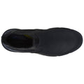 A black slip-on shoe is displayed resting on a flat surface showcasing its smooth upper material and elastic side panels designed for easy wear in casual or work settings.