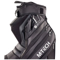 A black and gray golf bag stands upright featuring numerous zipped compartments and pockets with the brand name M-TECH prominently displayed on the side. It is designed for carrying golf clubs and accessories.