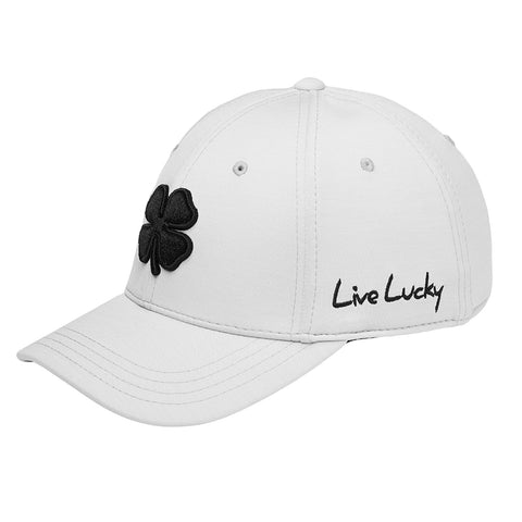 A white baseball cap features a black clover emblem on the front and the phrase Live Lucky embroidered on the side presenting a casual and stylish accessory for outdoor wear.