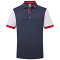 A navy blue polo shirt features a three-button placket with a red and white accent on the sleeves and collar designed for casual or athletic wear.