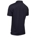 A dark navy polo shirt is displayed hanging against a plain background with the collar and short sleeves visible emphasizing the smooth fabric and clean design without any logos or embellishments.