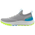 A gray athletic shoe features a sleek design with a textured upper and bright green outsole. It is positioned sideways, showcasing its modern style and branding on the heel.