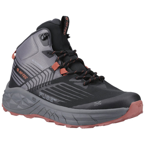 A high-top outdoor shoe features a dark upper with grey and orange accents tightly laced and designed for traction and support suitable for hiking and rugged terrain.