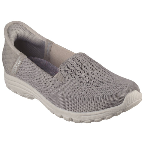 A gray slip-on shoe features a breathable mesh upper and a cushioned sole designed for comfort it is set against a plain white background