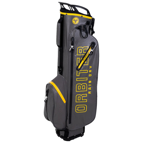 A gray golf bag featuring yellow accents stands upright with multiple compartments and a branded design. It is designed to keep contents dry, suitable for rainy weather conditions.