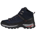 A navy blue hiking boot features a high ankle design and textured surface with gray and red accents, suitable for outdoor activities and providing support on rugged terrain.