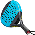 A paddle is angled with a textured grip and perforated surface displaying blue and black colors along with brand markings placed on a neutral background suggesting a focus on sports equipment for racquet sports.