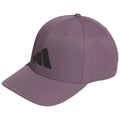 A purple cap is displayed prominently with a curved brim and an adjustable strap The front features a black three-stripe logo against the purple fabric in a casual setting