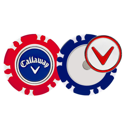 A golf marker shaped like a poker chip displays a red and blue design with the word Callaway and a checkmark emblem while the chips rest against each other on a plain surface.