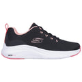 A black athletic shoe with pink accents sits on a white background featuring a mesh upper and a thick white sole labeled with VAPOR FOAM, designed for comfort and support.