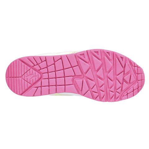 A running shoe sole features a pink rubber bottom with textured tread patterns designed for grip and traction on various surfaces highlighting the shoe's athletic purpose.