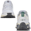 White athletic shoes are shown from the front and back with a grey sole and mesh upper highlighting the K-Swiss logo and branding in green and black against a plain white background