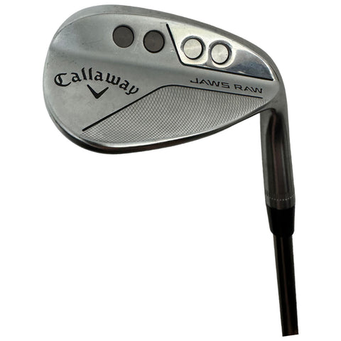 A golf club with a shiny metal head labeled Callaway JAWS RAW is angled to showcase its face and shaft designed for precision in striking golf balls on a course.