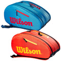 Two tennis bags are displayed one blue with red accents and the Wilson logo prominently featured and one orange with yellow accents also showing the Wilson logo both feature zippers and carrying straps.