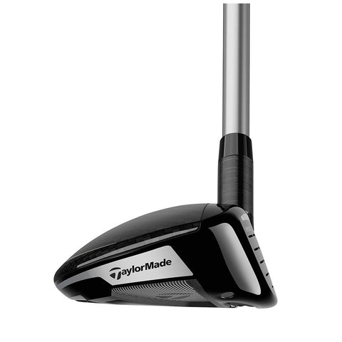 A black golf driver with a sleek design and a silver accent displays the brand TaylorMade while positioned upright against a white background highlighting its modern shape and finish.