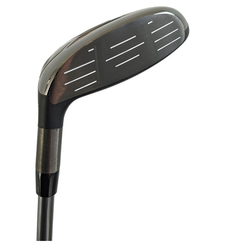 A golf club head is angled as if ready to strike a ball the sleek metal surface has grooves and markings that facilitate contact with the ball for precise shots