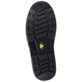 A black shoe sole is displayed with a textured pattern designed for grip and traction this object represents footwear designed for durability and stability in various environments.