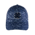 A navy baseball cap displays a stitched four-leaf clover emblem on the front with a textured pattern throughout the fabric creating a casual outdoor accessory suitable for sun protection.