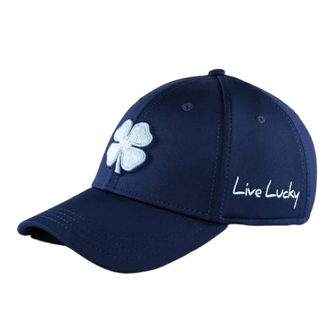 A blue baseball cap features a white embroidered four-leaf clover on the front and the phrase Live Lucky stitched on the side, designed for casual wear or outdoor activities.