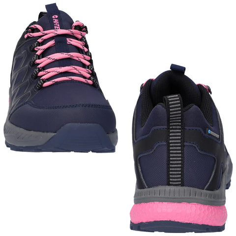 A pair of navy blue hiking shoes with pink laces and a pink accent on the sole is displayed from the front and back showcasing their design and functionality.