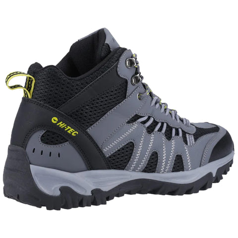 A gray and black hiking boot stands upright showcasing its padded collar and mesh sides designed for breathability featuring laces and hooks for secure fastening intended for outdoor activities.